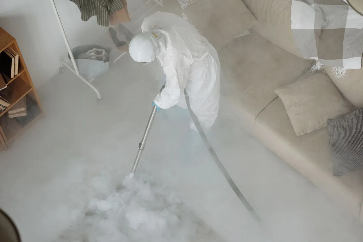 Biohazard cleanup technician in protective equipment, Wellsville, UT